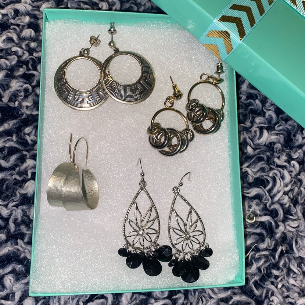 Silver earrings.